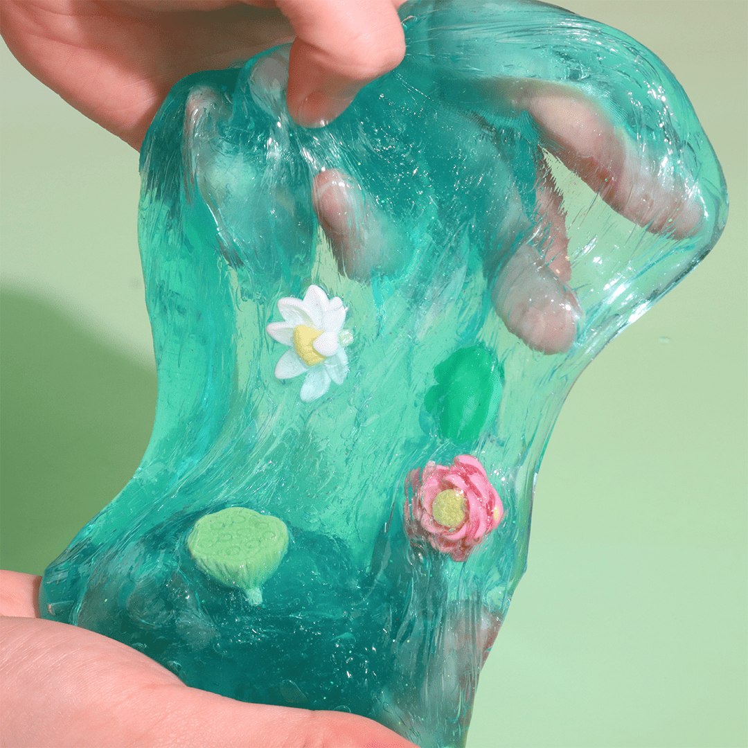 Ocean Crystal Slime | Water Slime with Lotus Charms | Crystal Clear Slime | DIY Slime Kit | Slime ASMR | Best Slime for Sensory Play | Cool Slime with Floral Accents | Stretchy & Transparent Slime | Relaxing Jelly Slime | Safe Slime Play for Kids & Adults | Fun & Soothing Tactile Experience | Slime Restock | Buy Slime Online | Slime Store | Best Slime Shop | Slime Website | Where to Buy Slime | Cute Slime | Pixel Dust Slime | Cheap Slime | Slime Winsons | Interactive Play Slime