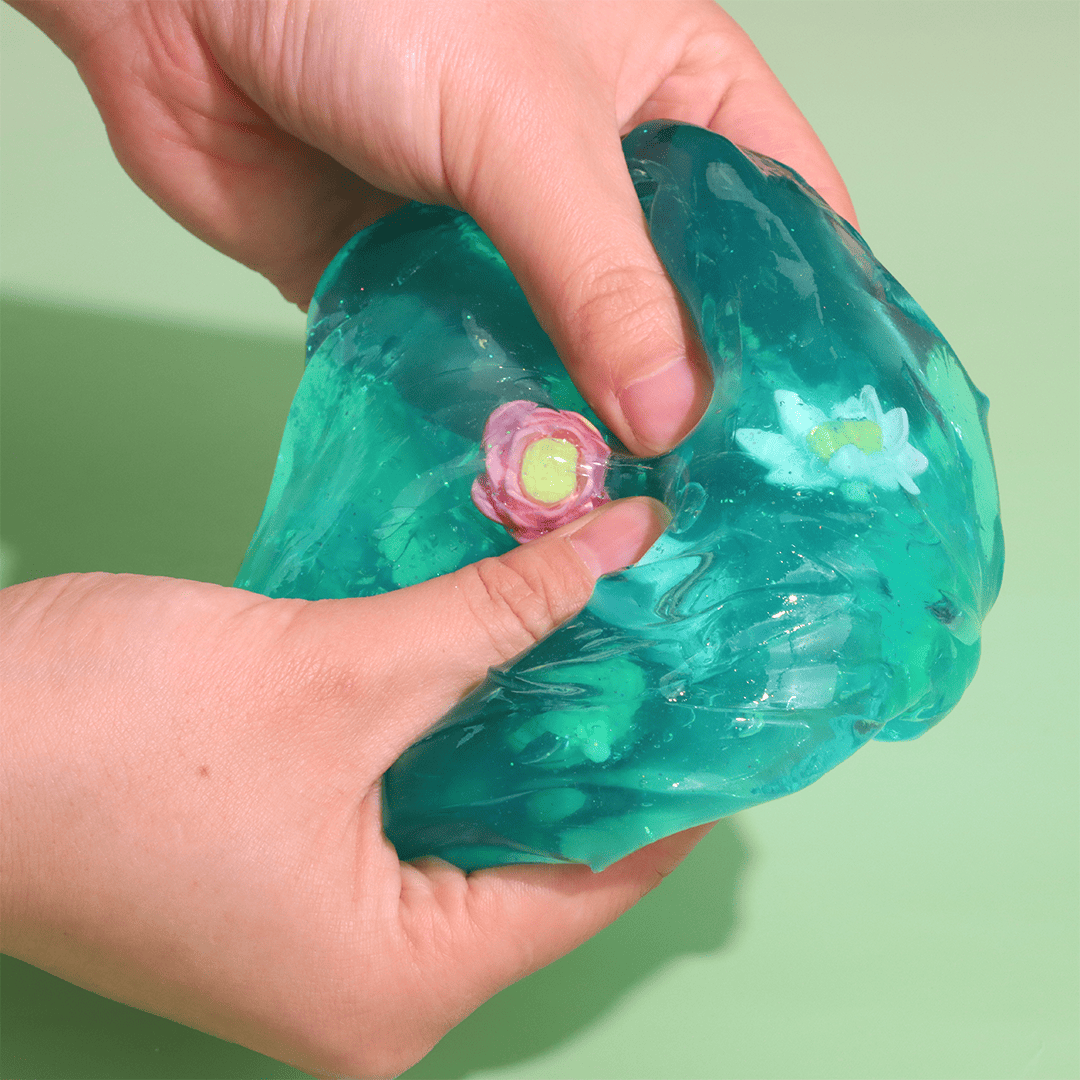 Ocean Crystal Slime | Water Slime with Lotus Charms | Crystal Clear Slime | DIY Slime Kit | Slime ASMR | Best Slime for Sensory Play | Cool Slime with Floral Accents | Stretchy & Transparent Slime | Relaxing Jelly Slime | Safe Slime Play for Kids & Adults | Fun & Soothing Tactile Experience | Slime Restock | Buy Slime Online | Slime Store | Best Slime Shop | Slime Website | Where to Buy Slime | Cute Slime | Pixel Dust Slime | Cheap Slime | Slime Winsons | Interactive Play Slime